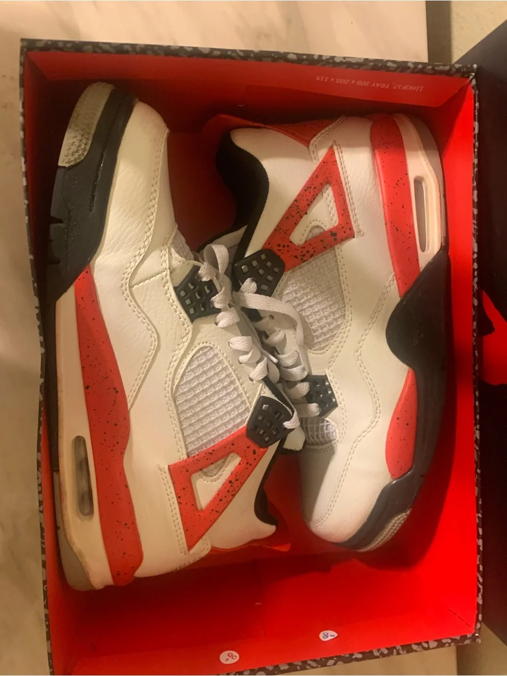 Jordan Retro 4 Sneakers in White/Red/Black